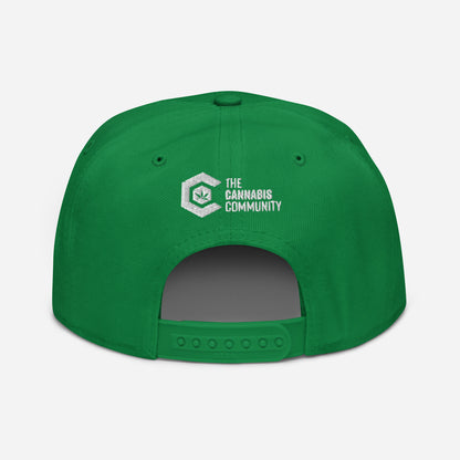 Golden Goat Cannabis Snapback Hat with "the cannabis community" logo embroidered in white on the front.