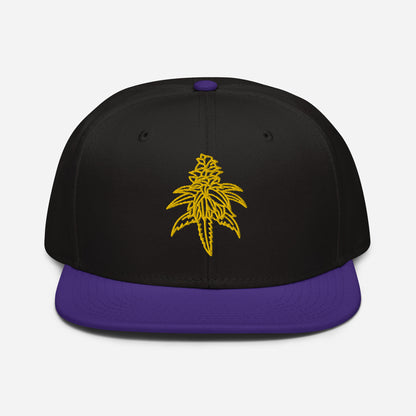Golden Goat Cannabis Snapback Hat with a black and purple design embroidered on the front.