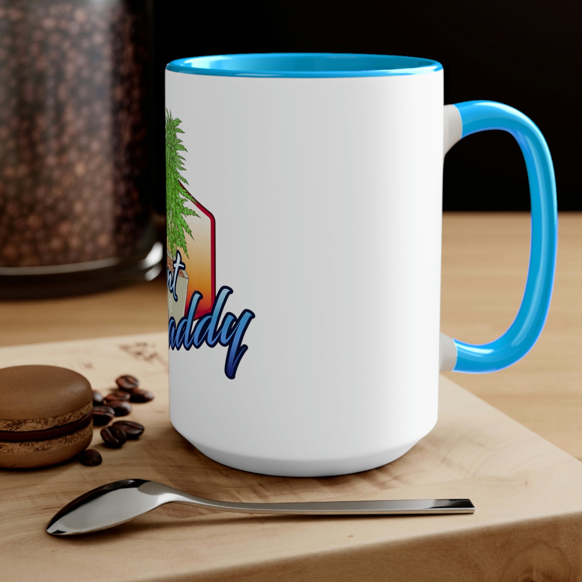 a white Cannabis Plant Daddy Coffee Mug with a blue lid and a cup of coffee.