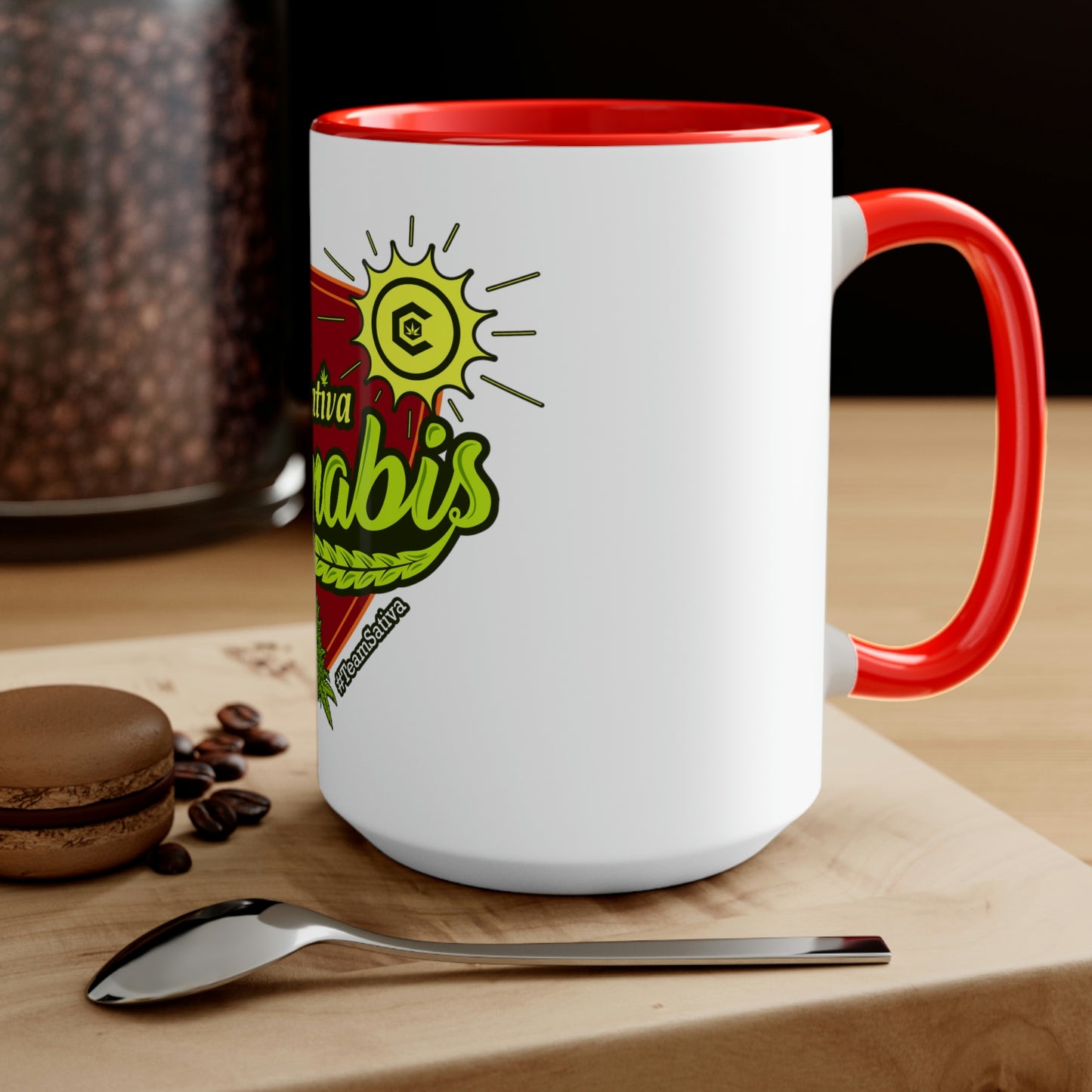 a Team Sativa Cannabis Coffee Mug with a heart on it and a cup of coffee.