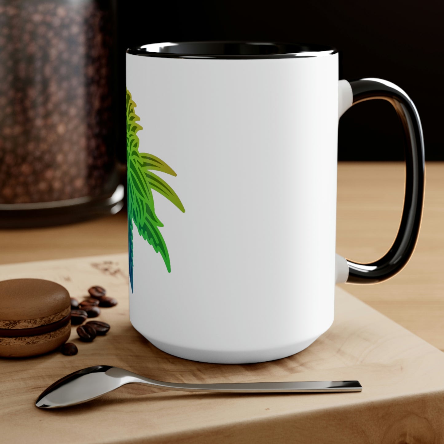 a Rainbow Sherbet Marijuana Tea Mug with a green flower on it.