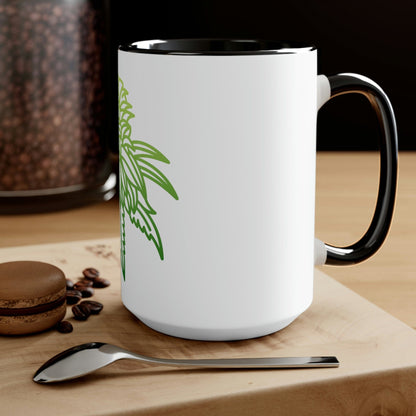 a Sour Diesel Cannabis Tea Mug with a green leaf on it.