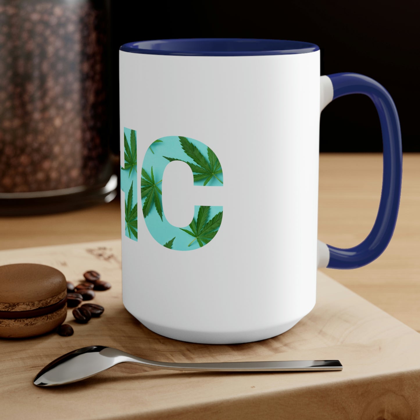 A Turquoise THC Tea Mug with the word hc on it.