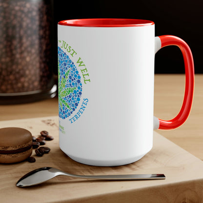 a Not High, Just Well Coffee Mug with a spoon and coffee beans on it.