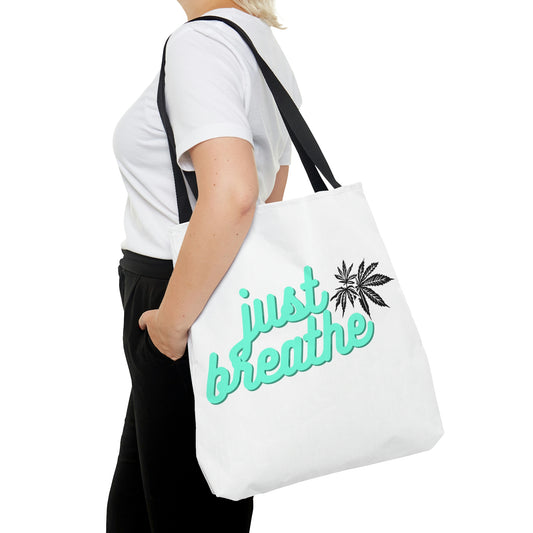 A woman in a white shirt carries the Just Breathe Cannabis Tote Bag