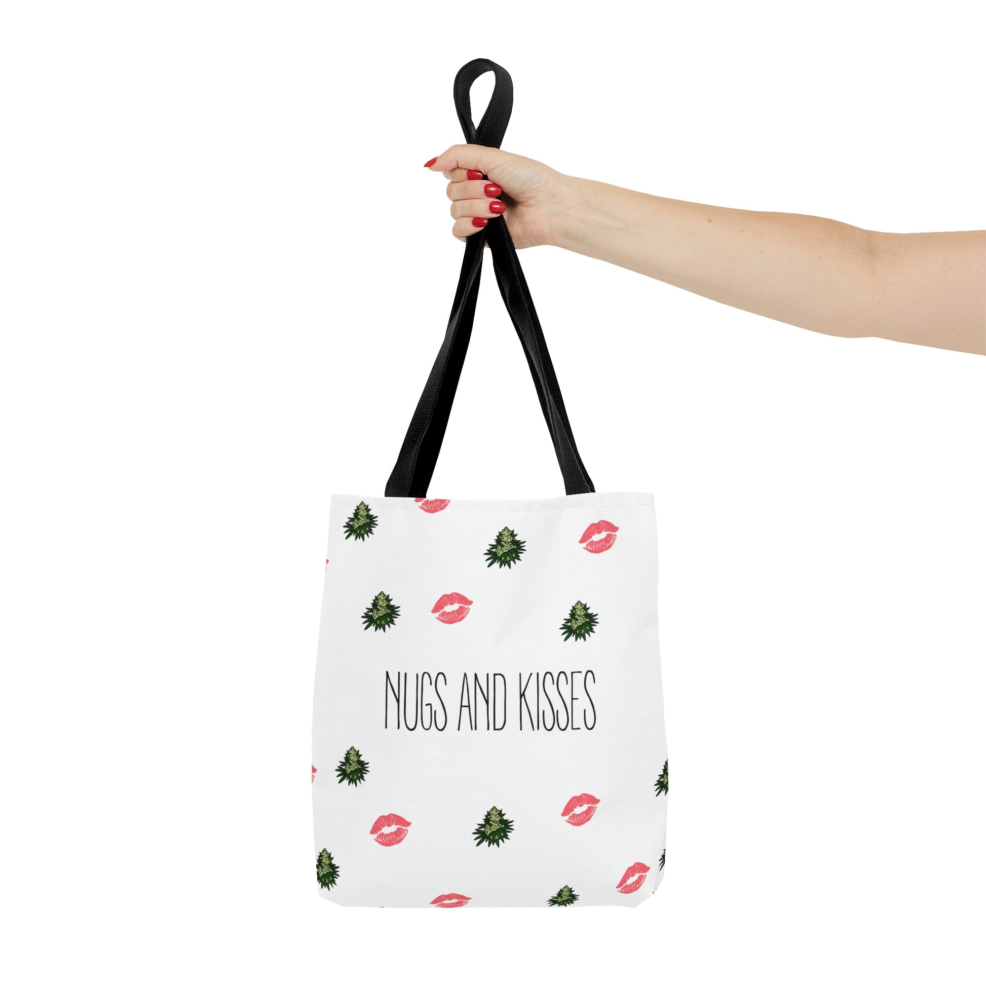 A person is holding the decorative Nugs and Kisses Weed Tote Bag