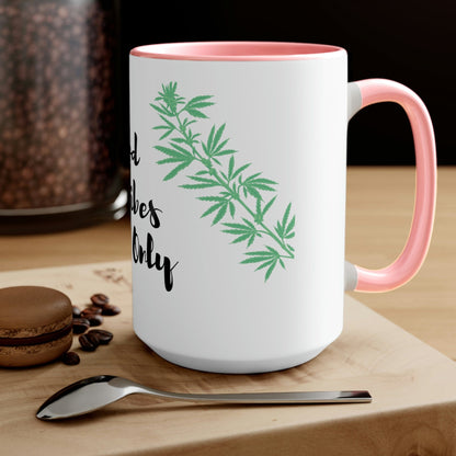 The Good Vibes Only Marijuana Mug, featuring a white body with a pink handle and a cannabis-inspired design 