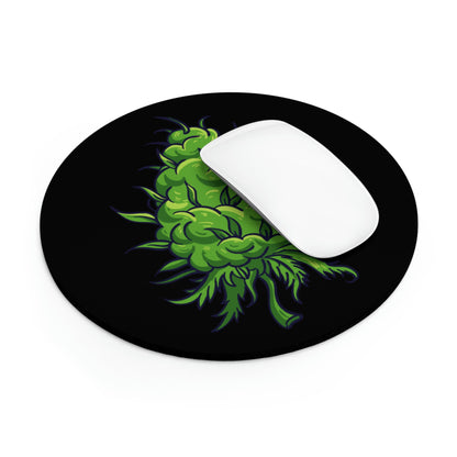 Round black Big Cannabis Nug Mouse Pad featuring a vibrant green cannabis nug design, with a non-slip rubber Neoprene bottom and a white computer mouse resting on top.