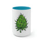 a white and blue Big Cannabis Nug Coffee Mug with a green marijuana plant on it.