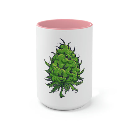 a white and pink Big Cannabis Nug Coffee Mug with a green marijuana plant on it.