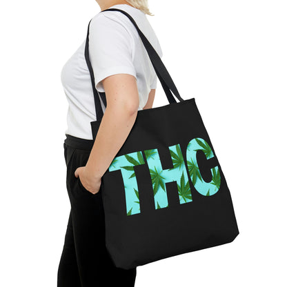 A woman is carrying a decorative THC Black Weed -Themed Tote Bag