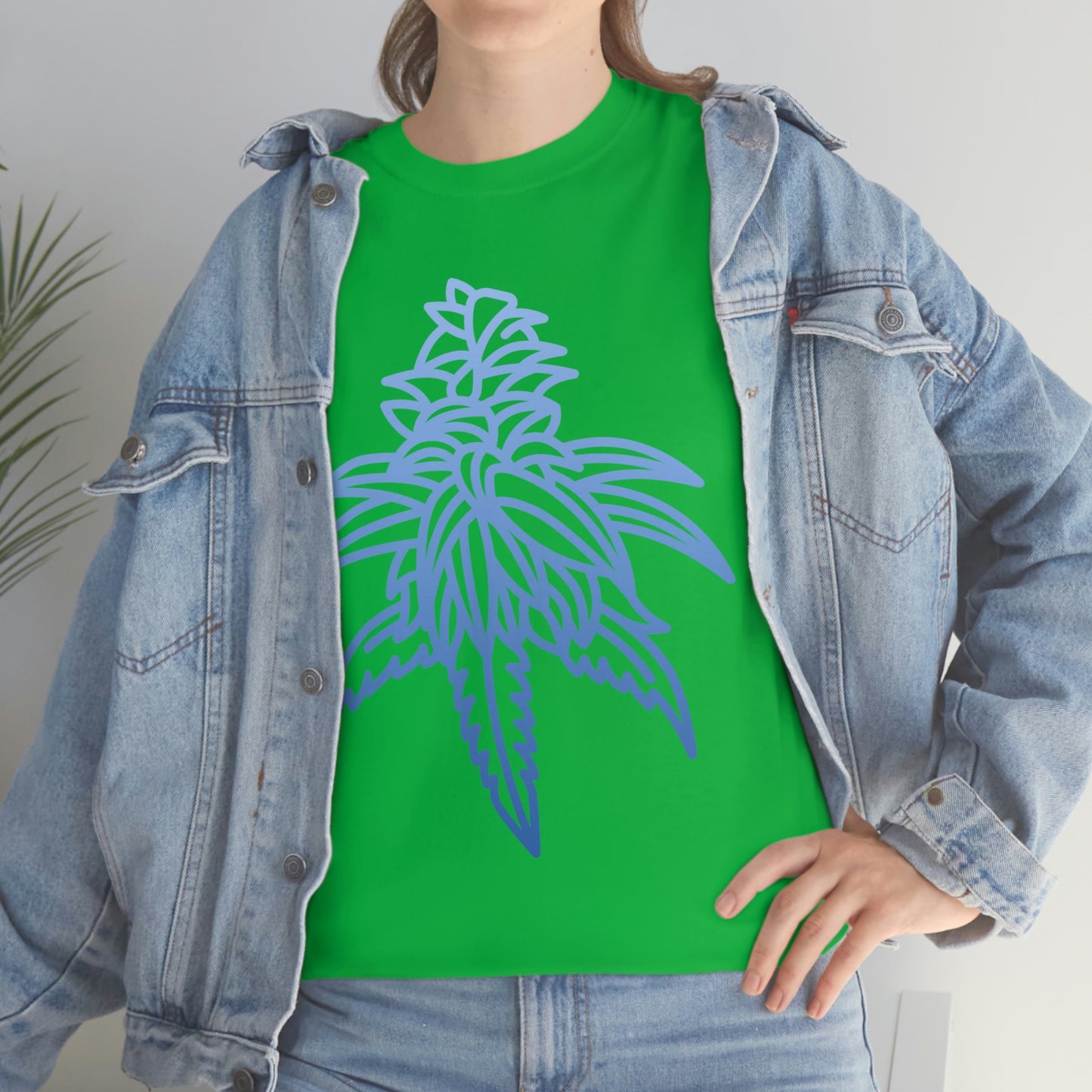 a woman wearing a Blue Dream Cannabis Tee and jeans.