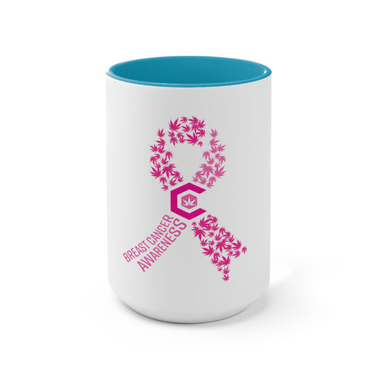 a Breast Cancer Awareness Coffee Mug with a pink ribbon on it.