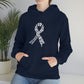 a woman wearing a Breast Cancer Awareness Cannabis Pullover Hoodie with a ribbon on it.