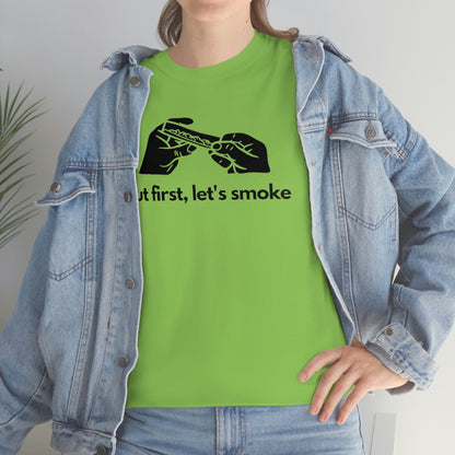 a woman wearing a green But First, Let's Smoke Tee.