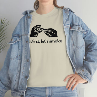 a woman wearing a But First, Let's Smoke Tee.