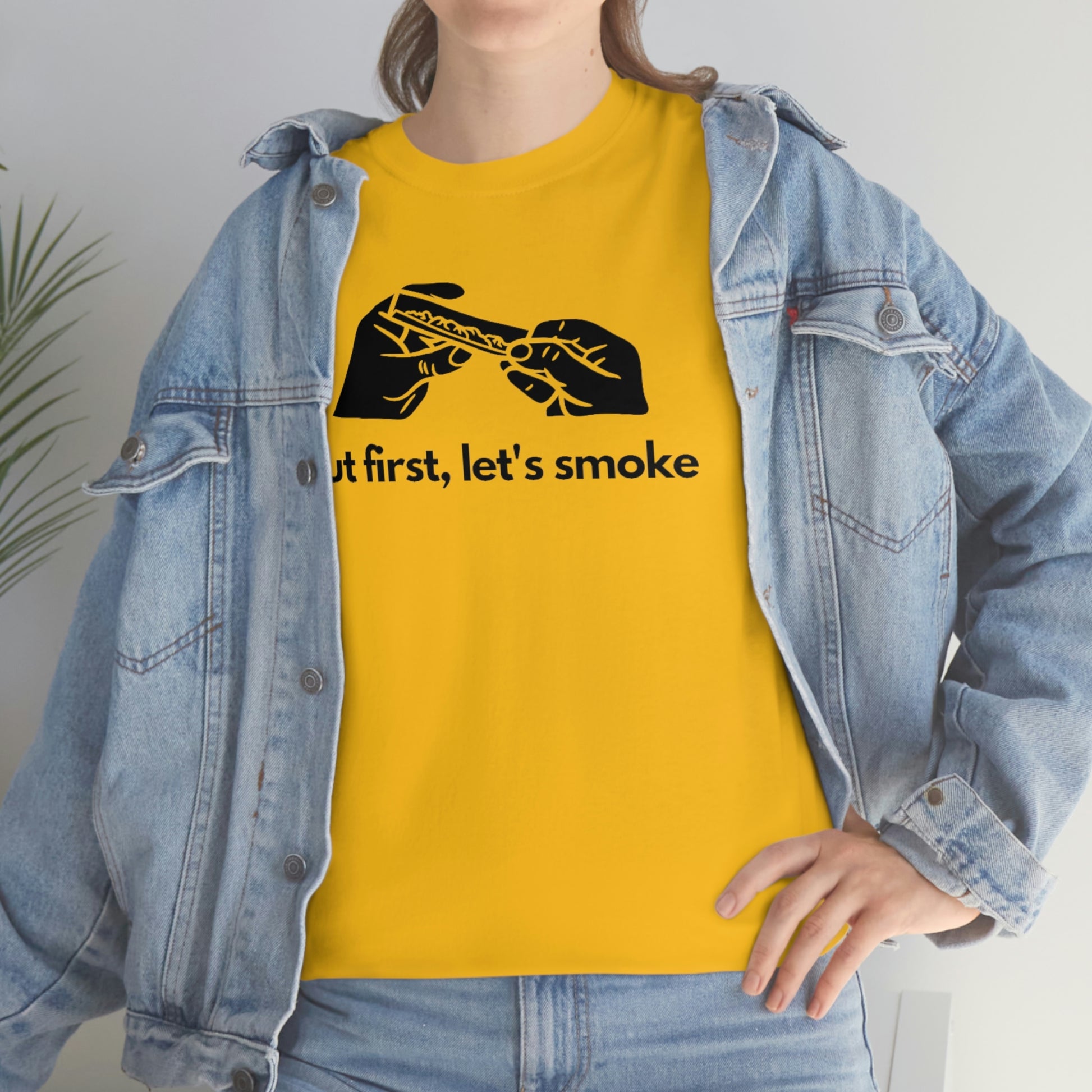 a woman wearing a yellow But First, Let's Smoke Tee.