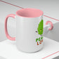 a Cannabis, Peace and Love Coffee Mug with a green leaf on it and a pink handle.