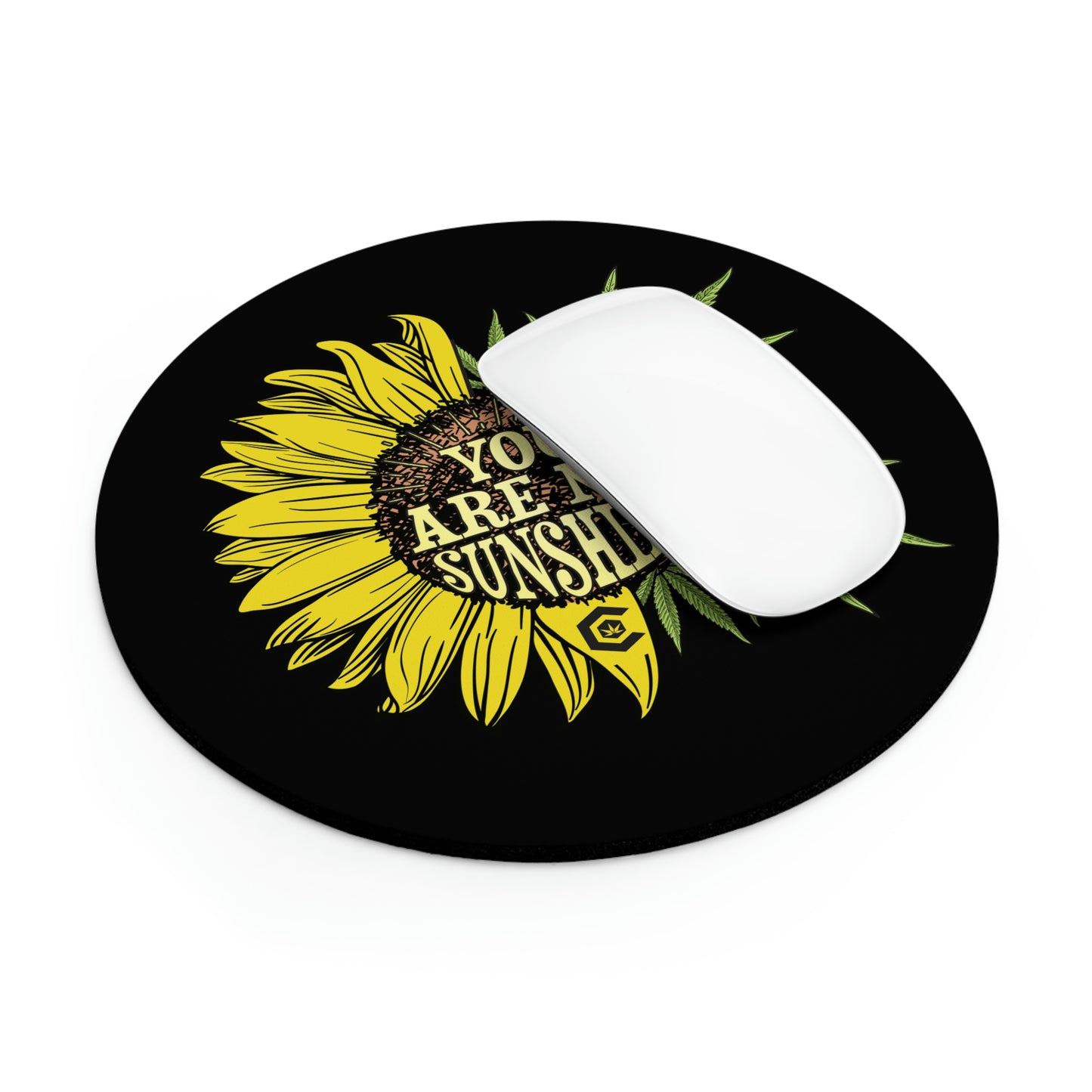 This circle You Are My Sunshine Mouse Pad is being used in junction with a white wireless mouse to show an ultimate angle of the pad in use.