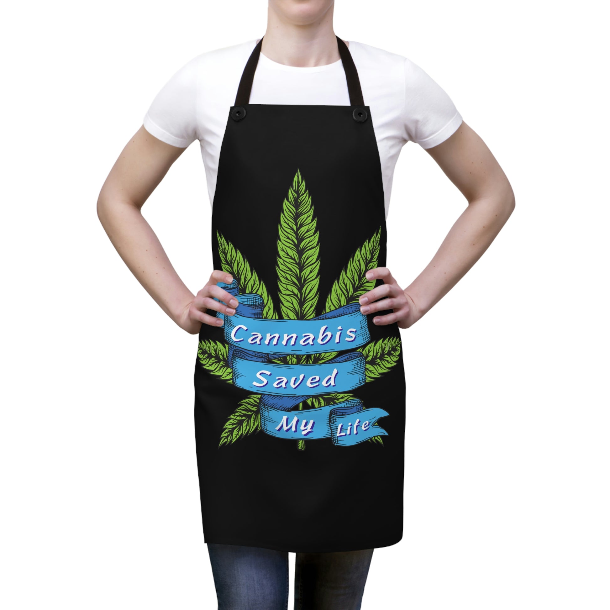A young lady is wearing the Cannabis Saved My Life Chef's Apron with words written on a blue ribbon design 