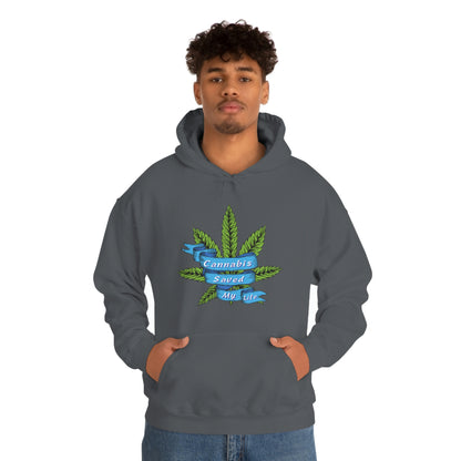 A man wearing a gray Cannabis Saved My Life Cannabis Hoodie.