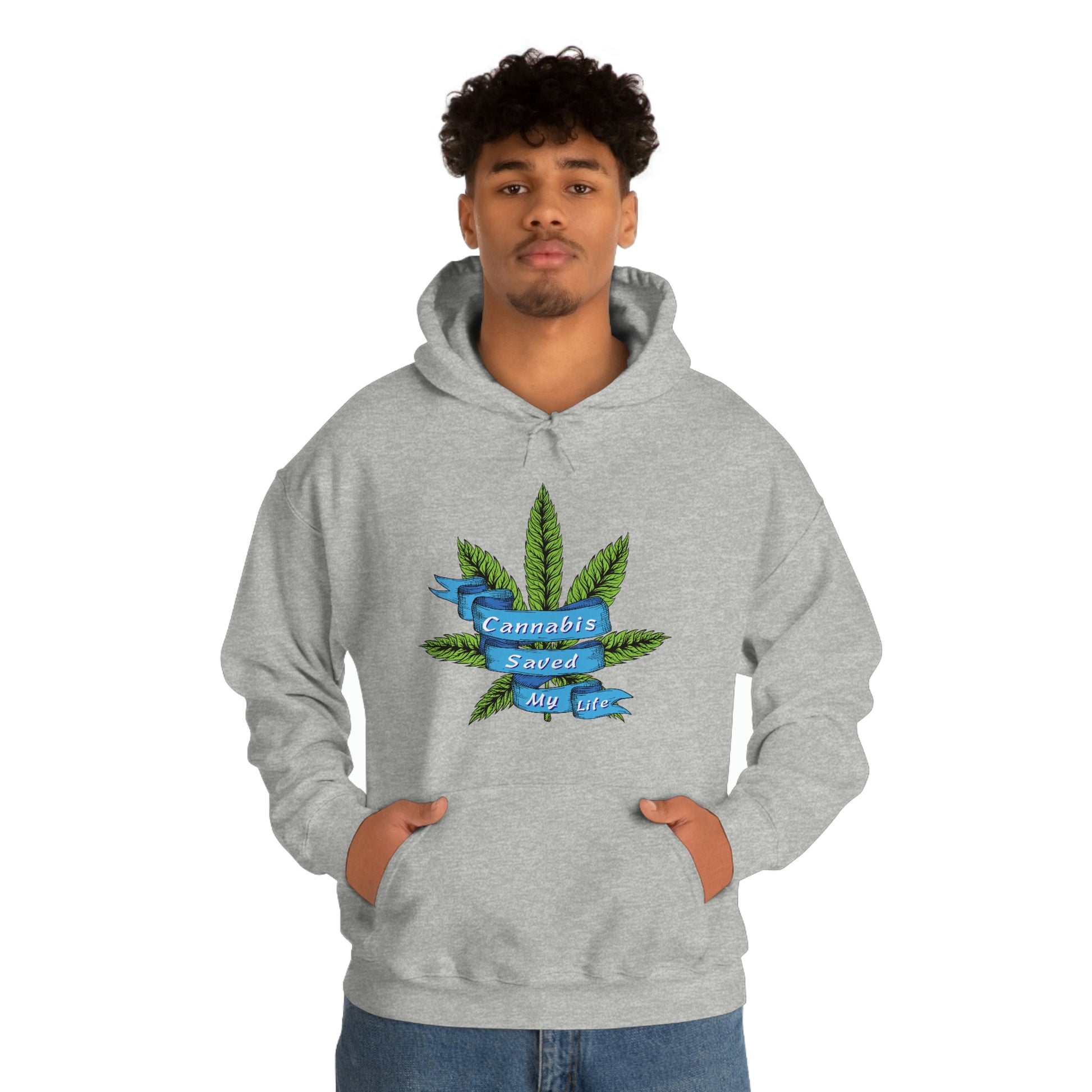 A man wearing a grey Cannabis Saved My Life Cannabis Hoodie with a marijuana leaf on it.