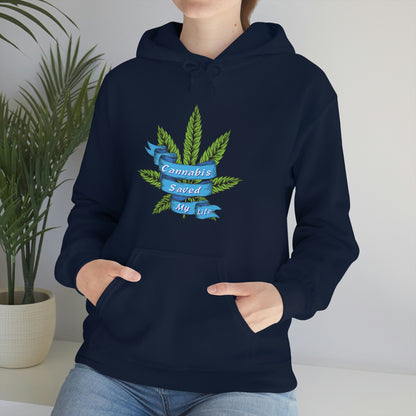 A woman wearing a Cannabis Saved My Life Cannabis Hoodie with a marijuana leaf on it.