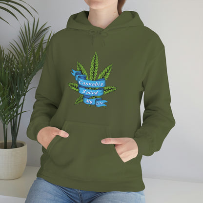 a woman wearing a green Cannabis Saved My Life Cannabis Hoodie with a marijuana leaf on it.