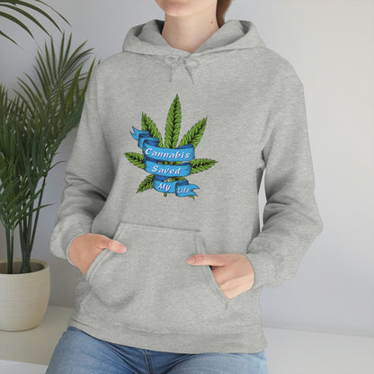 a woman wearing a gray Cannabis Saved My Life Cannabis Hoodie with a marijuana leaf on it.