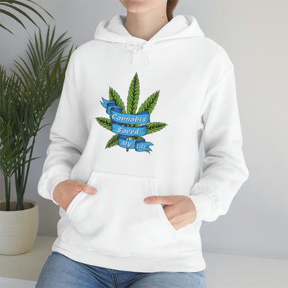 a woman wearing a white Cannabis Saved My Life Cannabis Hoodie with a marijuana leaf on it.