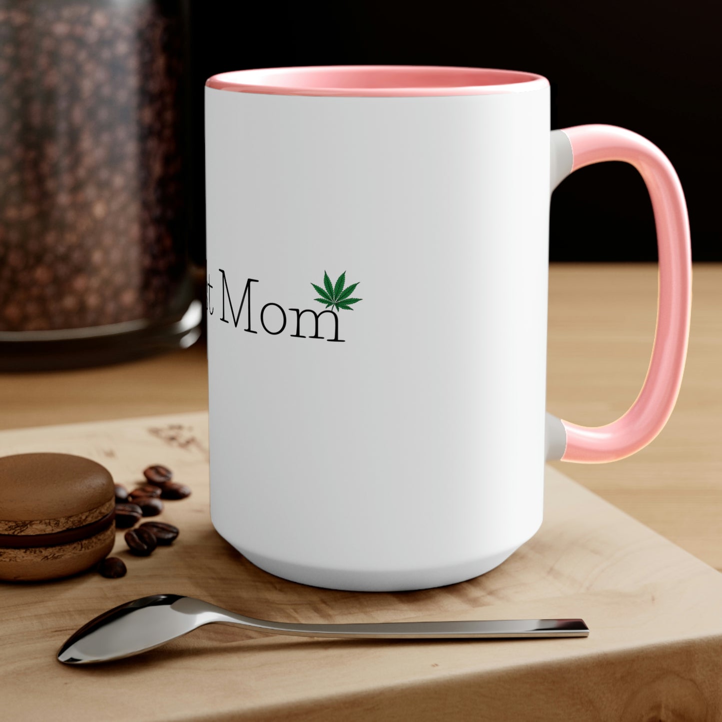 a Dopest Mom Pot Leaf Coffee Mug with the word mom on it.