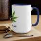 a Free the Plant Coffee Mug with a marijuana leaf on it.