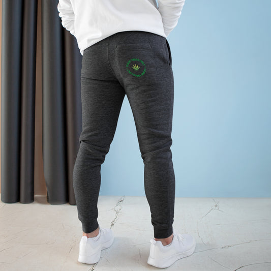 the back of a man wearing Good Vibes Premium Fleece Joggers and a sweatshirt.