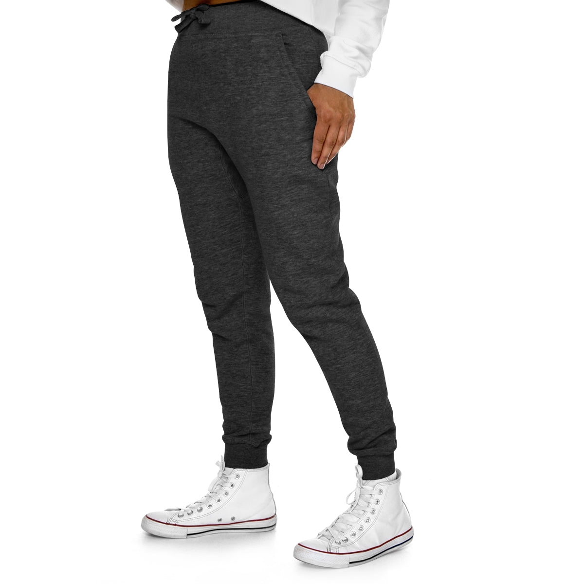 a woman wearing Good Vibes Premium Fleece Joggers and white sneakers.