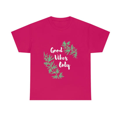 Good Vibes Only Leaf T-Shirt featuring a pink base adorned with the phrase "Good Vibes Only" surrounded by green leaves and subtle cannabis leaves.