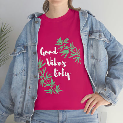 Individual dressed in a pink "Good Vibes Only Leaf T-Shirt" featuring cannabis leaf graphics, paired with a denim jacket.