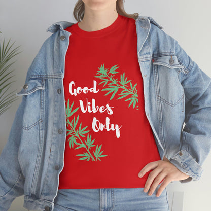 A person wears the "Good Vibes Only Leaf T-Shirt" in red, featuring stylized cannabis leaf designs, underneath a casual denim jacket.