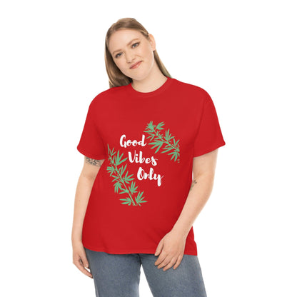 A person wearing the Good Vibes Only Leaf T-Shirt featuring cannabis leaf designs in red.