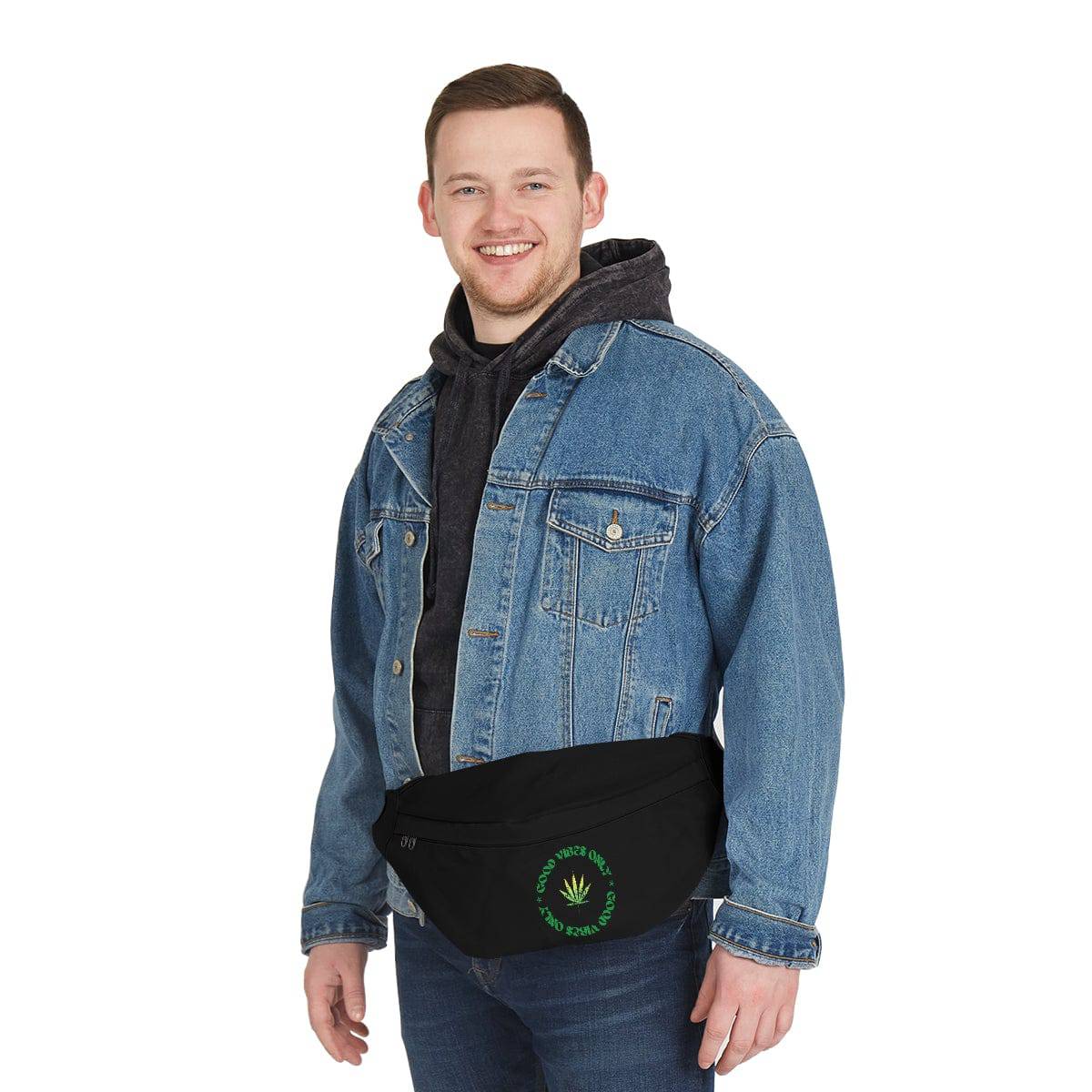a man wearing a black fanny pack with the words good vibes only circling a marijuana leaf