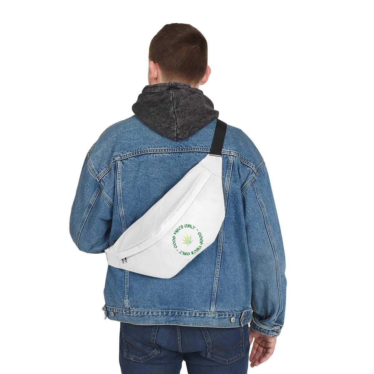 the back of a man wearing a white fanny pack with the words good vibes only circling a marijuana leaf