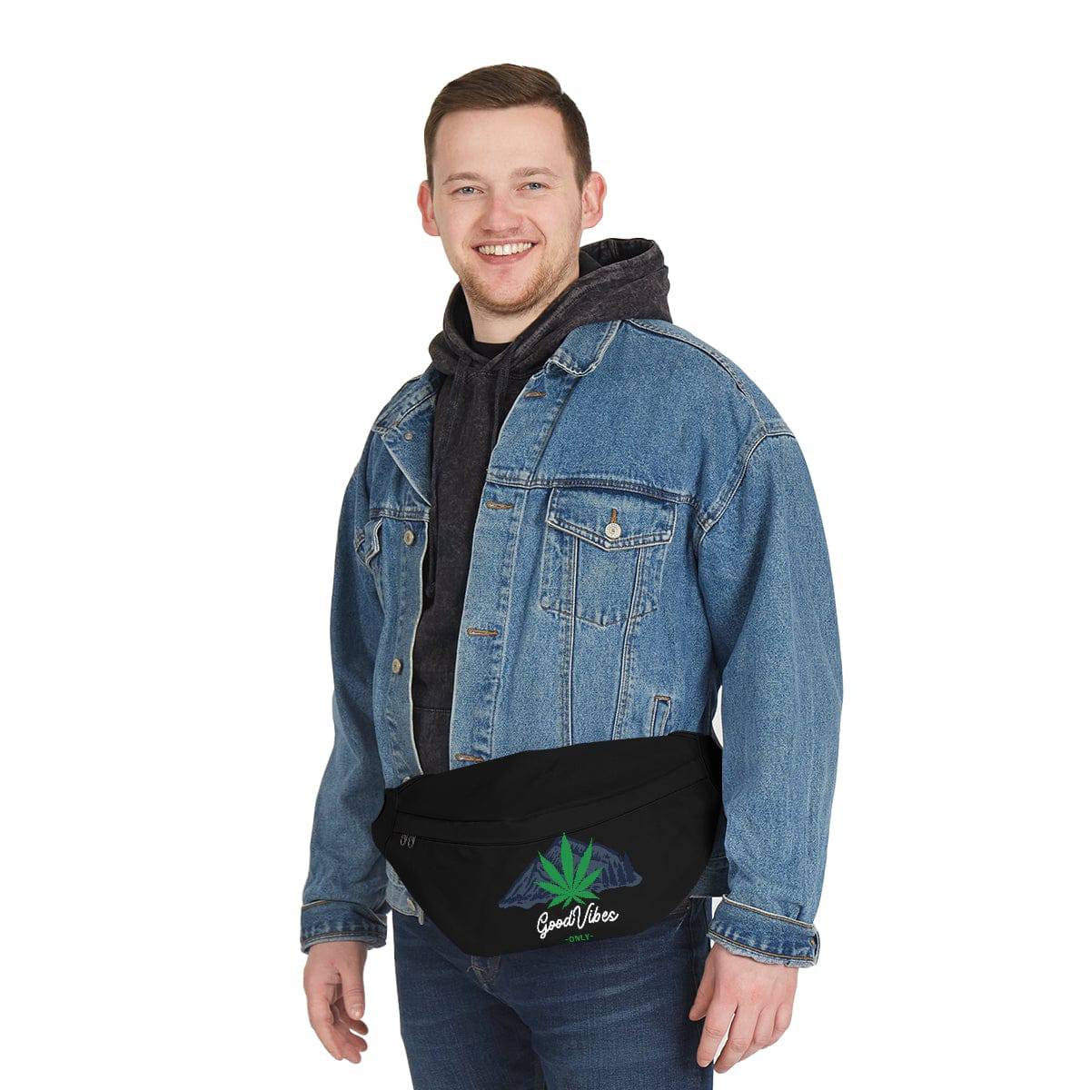 A man wearing a black, good vibes only marijuana fanny pack