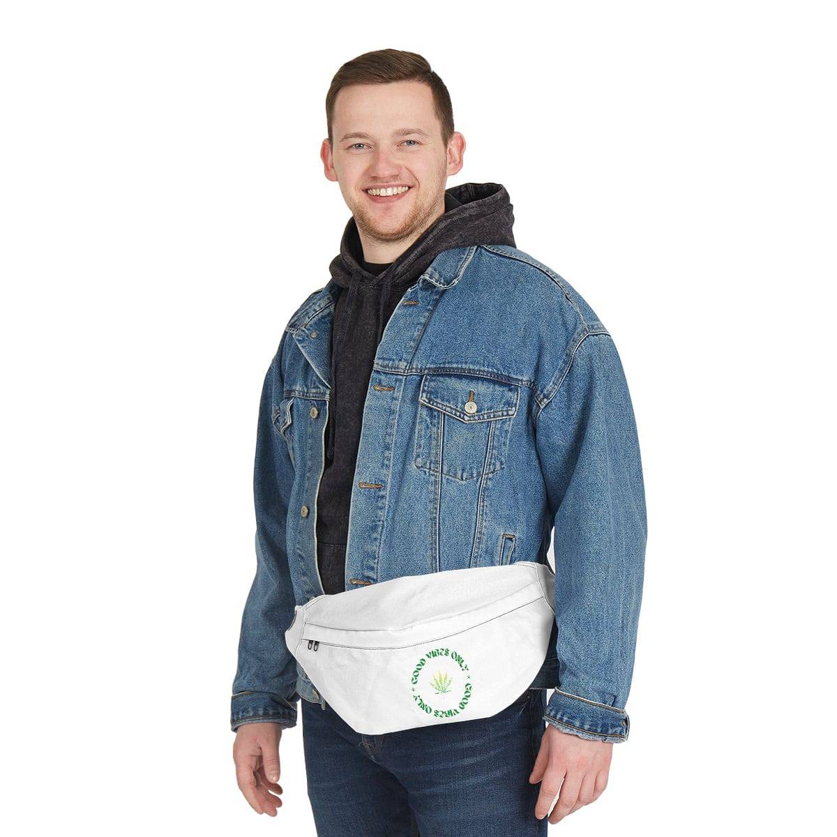 a man wearing a white fanny pack with the words good vibes only circling a marijuana leaf