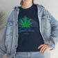 a woman wearing a denim jacket and a Good Vibes Only Mountain Tee.