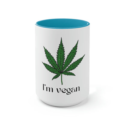 A white and light blue "I'm vegan" cannabis coffee mug on a white background