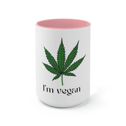 A white and pink "I'm Vegan" cannabis coffee mug on a white background