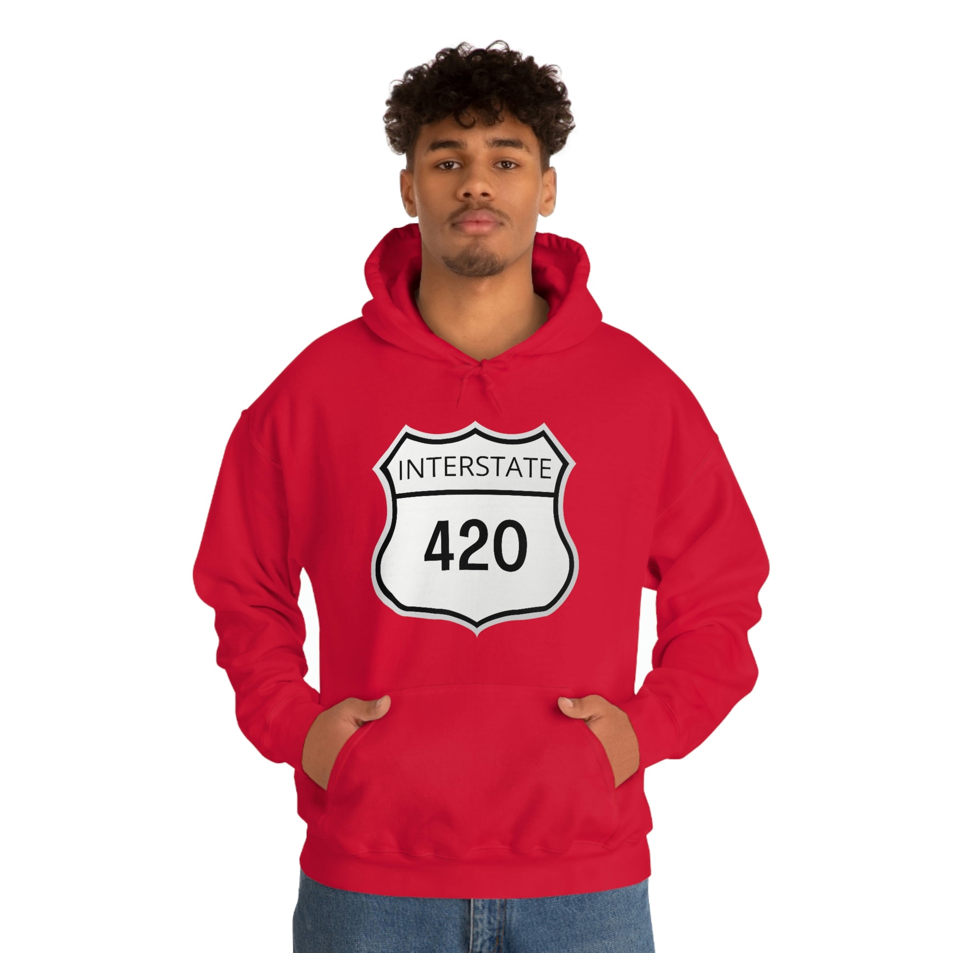 A young man wearing a red Interstate 420 marijuana hoodie with his hands in his hoodie pocket