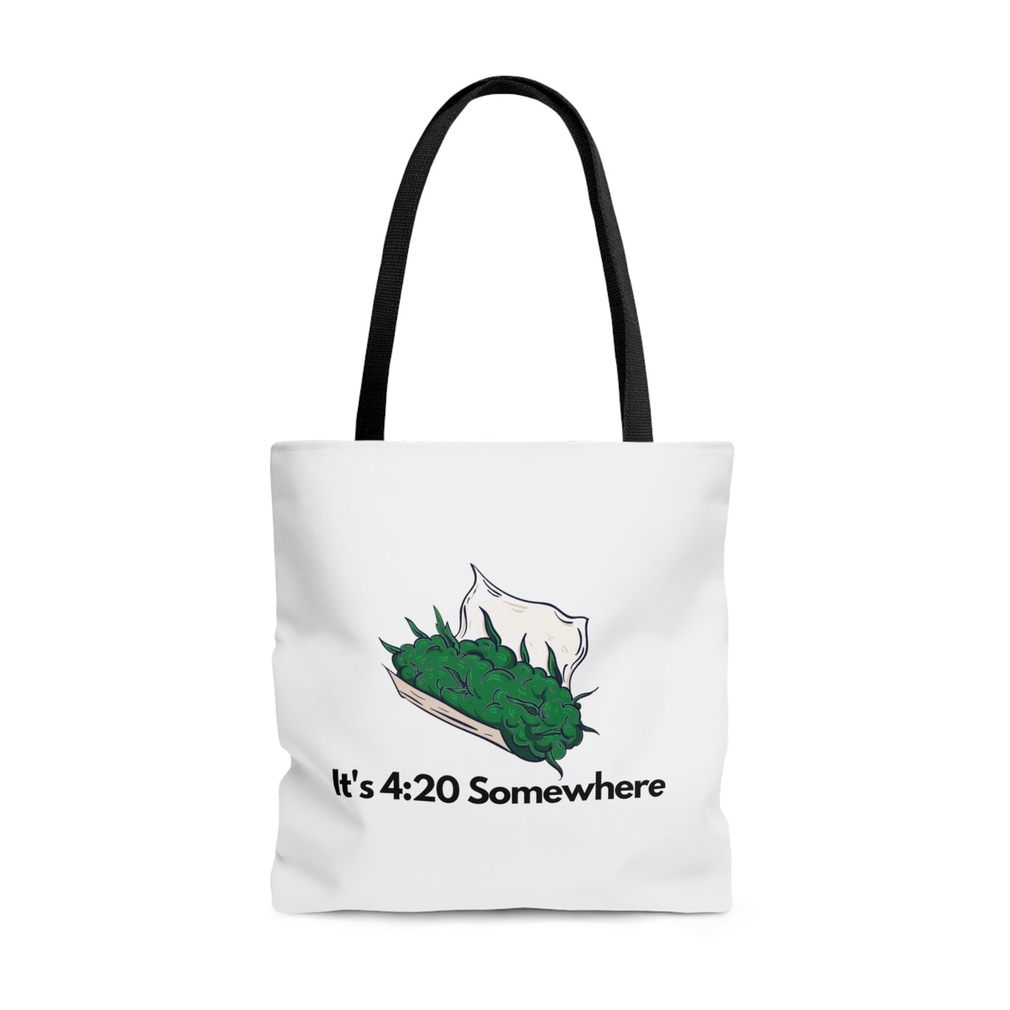 A white tote bag adorned with a vibrant green cannabis joint illustration, preparing to be rolled, accompanied by the cheeky phrase 'It's 420 Somewhere'
