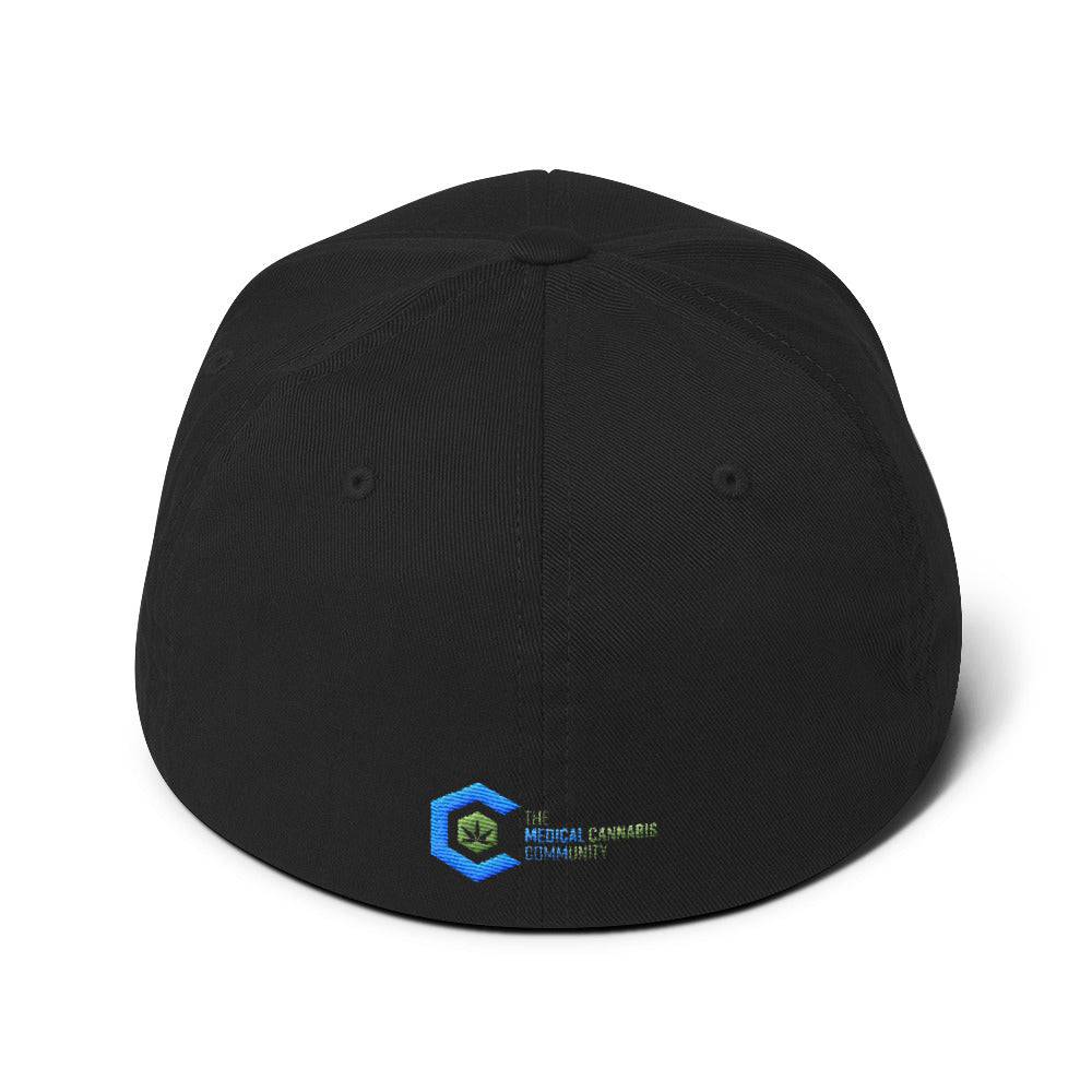 a black snapback hat showing The Medical Cannabis Community logo and has The Medical Cannabis Community stitched next to the logo on back