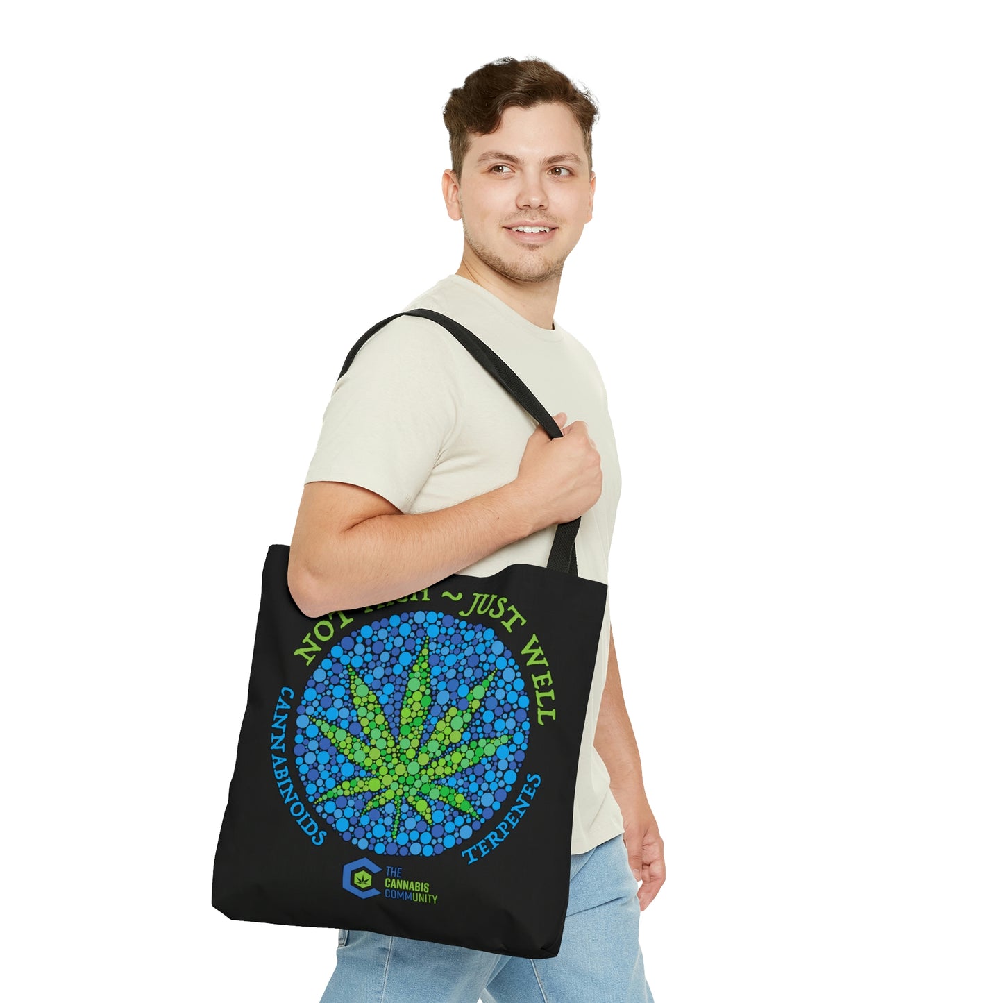A man wears a black with green weed leaf Not High, Just Well Medical Cannabis Tote Bag