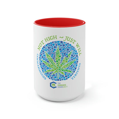 a Not High, Just Well coffee mug with a marijuana leaf on it.